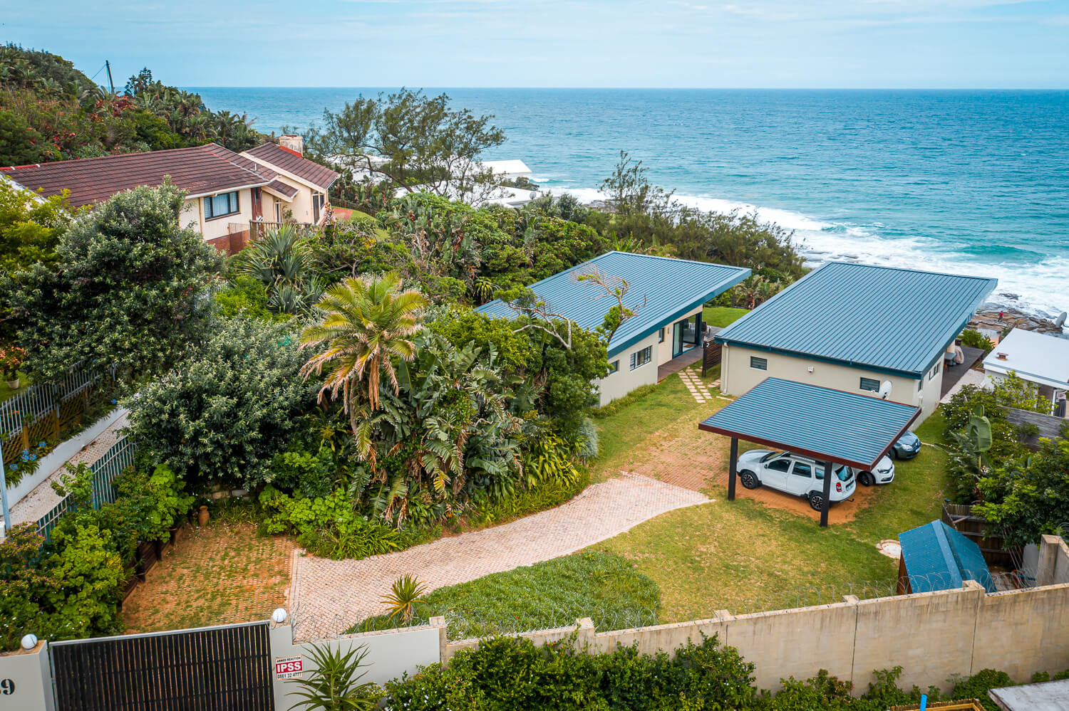 aeriel view of units with ocean